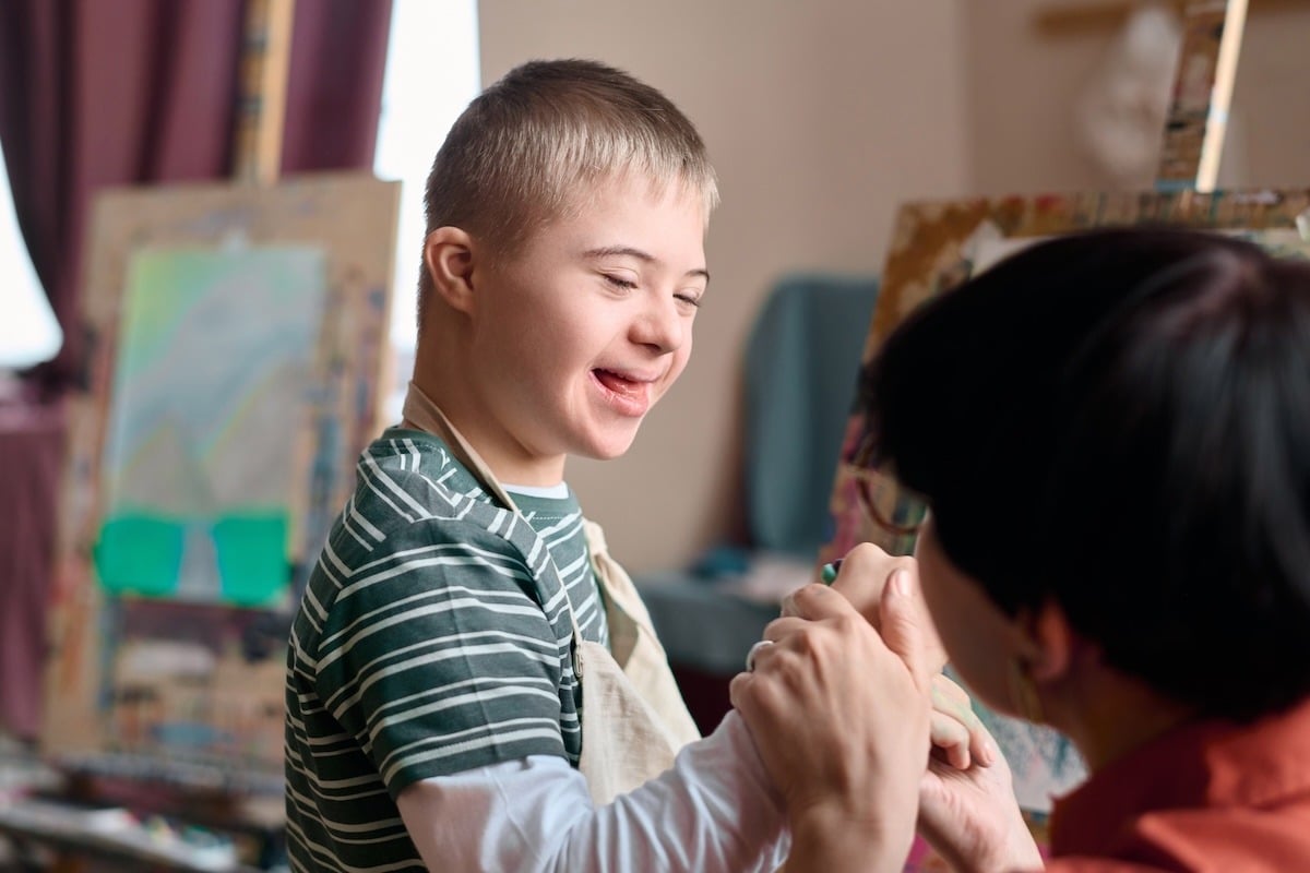 boy-with-down-syndrome-enjoying-art-class-2024-04-09-17-13-20-utc copy